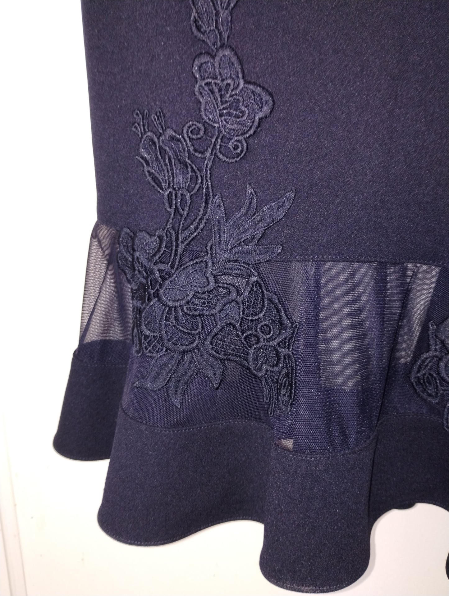 c Size 8 midnight blue princess line knee length. illusion v neck back and front.