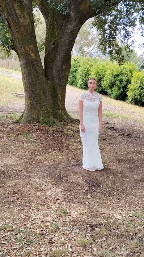 c Size 8 white lace straight dress.