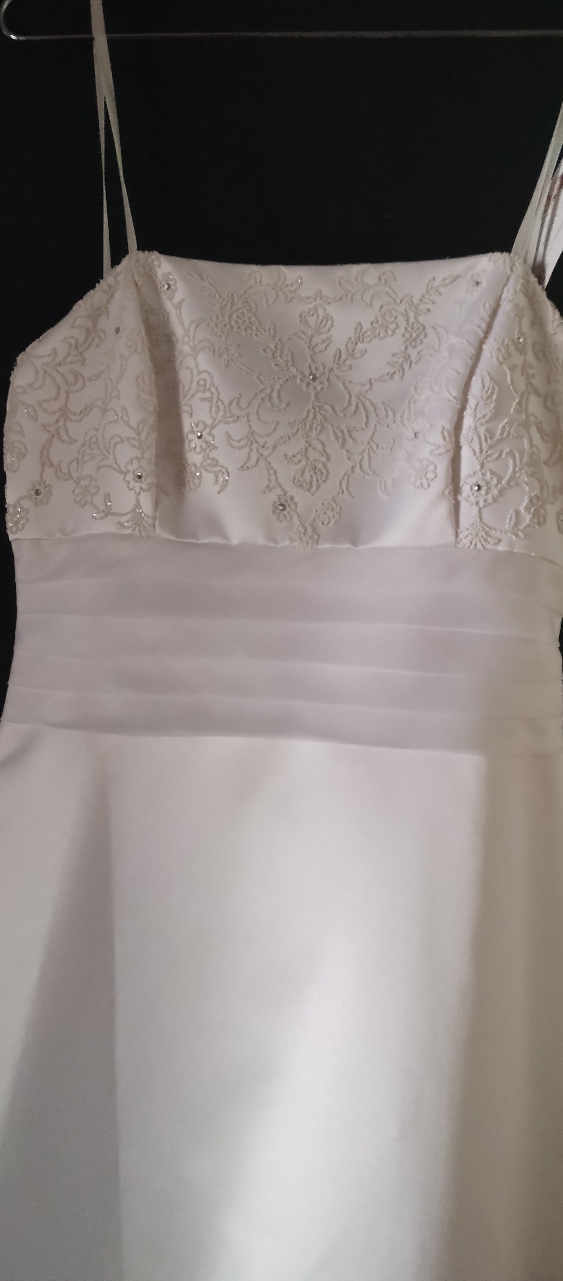 Size 10 White sheath full le Unique fine beaded and diamante fabric bodice and skirt detail. Waist detail of pleated georgette.