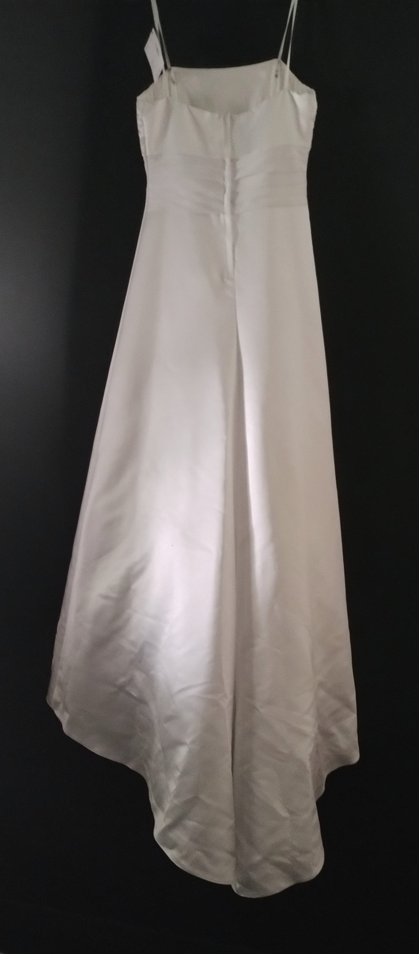 Size 10 White sheath full length with A line skirt and small train. Unique fine beaded and diamante fabric bodice and skirt detail. Waist detail of pleated georgette.