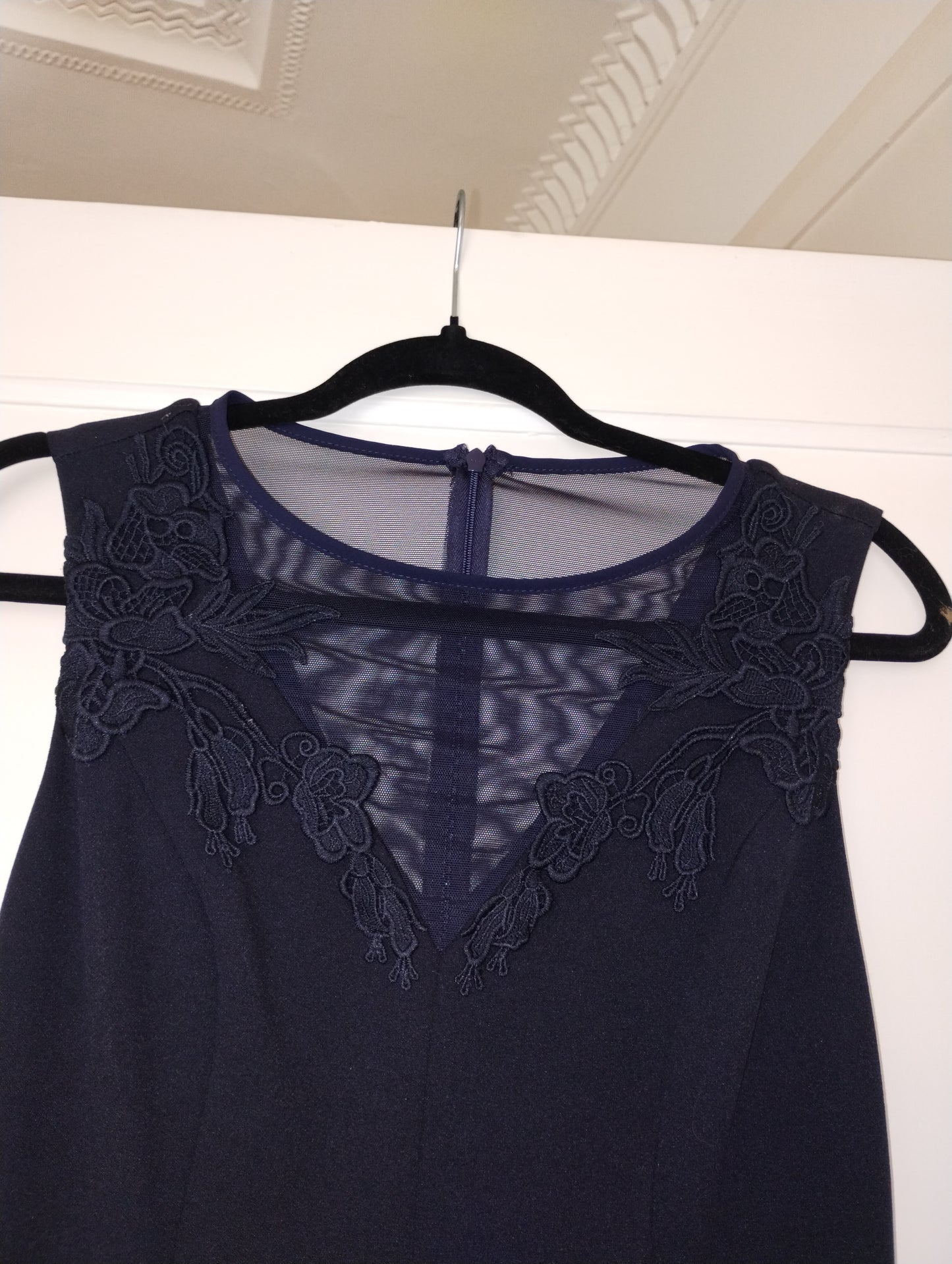 c Size 8 midnight blue princess line knee length. illusion v neck back and front.