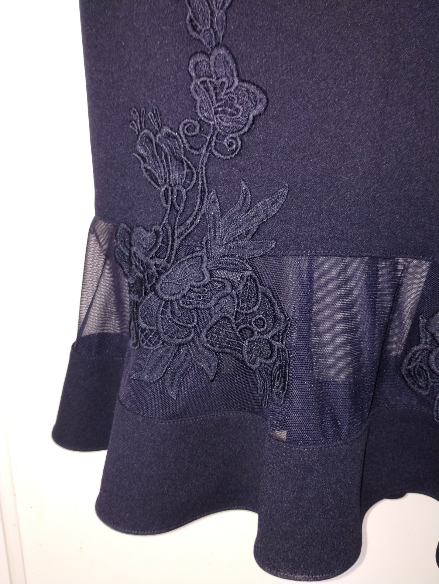 c Size 8 midnight blue princess line knee length. illusion v neck back and front.