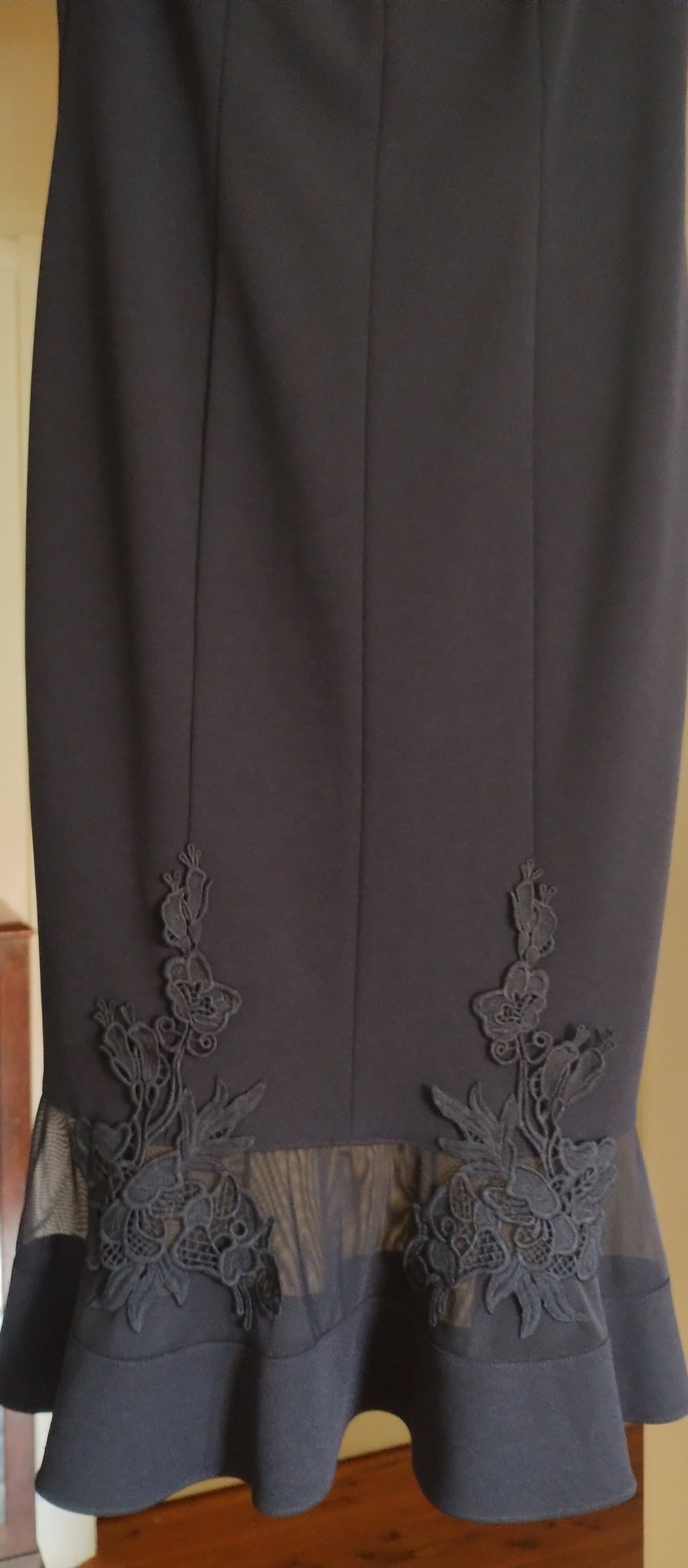 c Size 8 midnight blue princess line knee length. illusion v neck back and front.