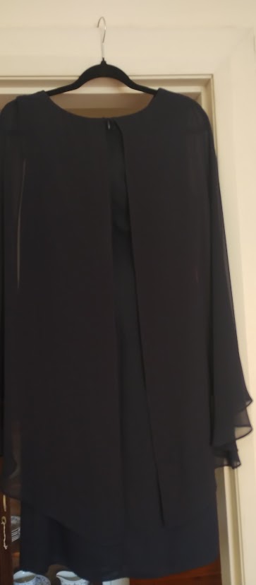 c size 8 navy straight knee length dress, georgette cape sleeves, with beaded neck detail.