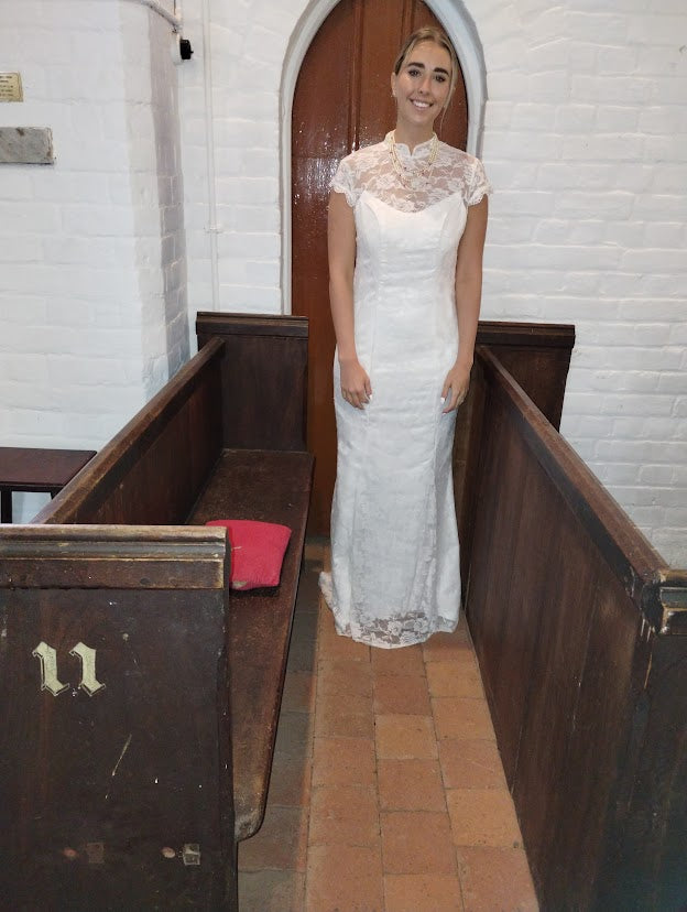 c Size 8 white lace straight dress.