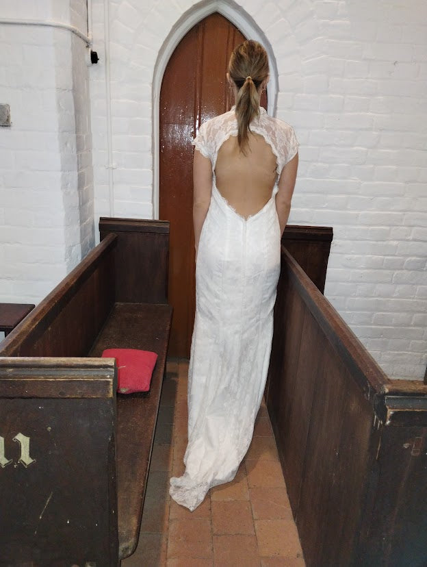 c Size 8 white lace straight dress.