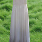 e Size 12 White delicately gathered bodice with beaded cap sleeves