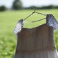e Size 12 White delicately gathered bodice with beaded cap sleeves