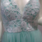 e Size12 Mint plunging neckline with short full skirt