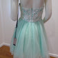 e Size12 Mint plunging neckline with short full skirt